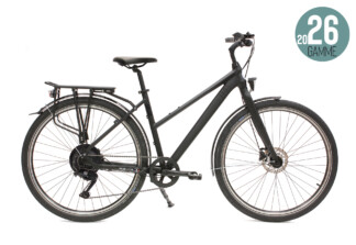 Vélo moderne à louer pour des balades en Normandie, équipé de porte-bagages. Idéal pour familles et amis.